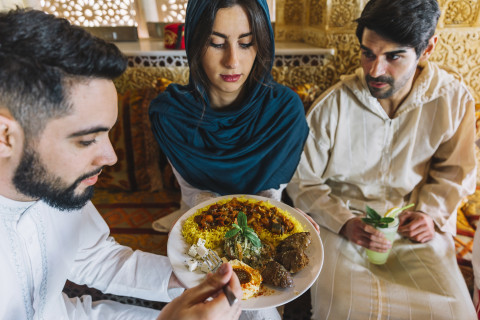 The Rise of Halal Fusion Cuisine: Blending Cultures While Honoring Faith 44 group young muslim friends restaurant