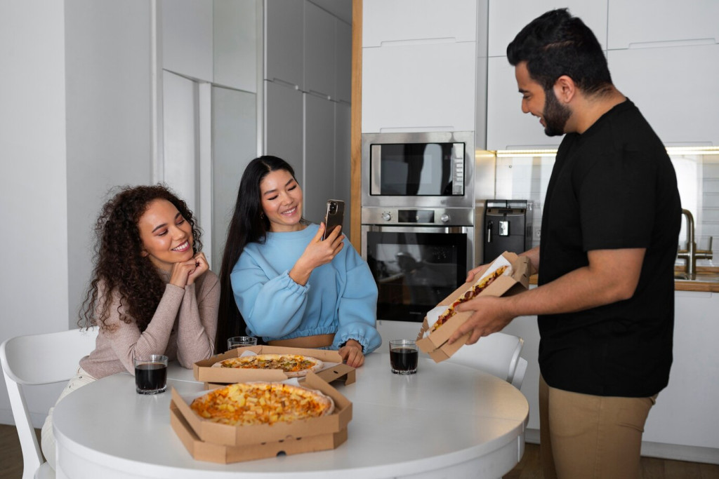 Fast Food Swaps: Make Your Favorite Takeout at Home 43 group friends eating pizza home together 23 2150419423