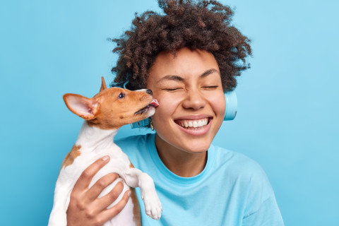 Top Nutrition Tips for Keeping Your Pets Healthy and Happy 44 people animals relationship concept happy positive curly african american woman poses with pet going have walk outdoor together small dog licks owner cheek expresses love being cared