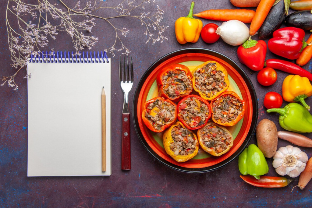 Simple Ways to Add More Vegetables to Every Meal 43 top view cooked bell peppers with different seasonings vegetables dark grey surface food dolma vegetable meal beef 140725 74494