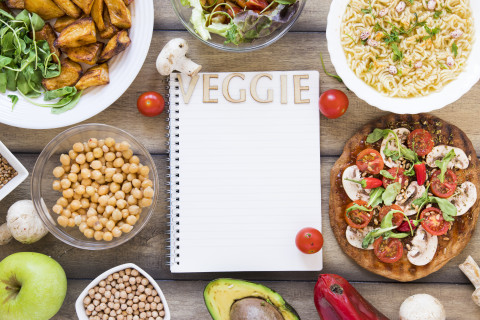 Vegetarian Meal Plans: Deliciously Balanced & Easy to Follow 85 veggie lettering notebook surrounded by veggie food 3
