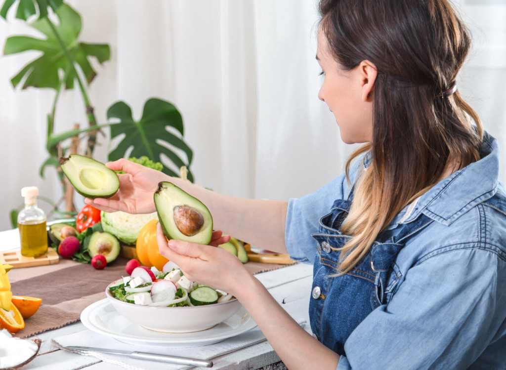 Simple Habits for Eating Healthier Every Day 43 young happy woman looking avocado dinner table 169016 6394